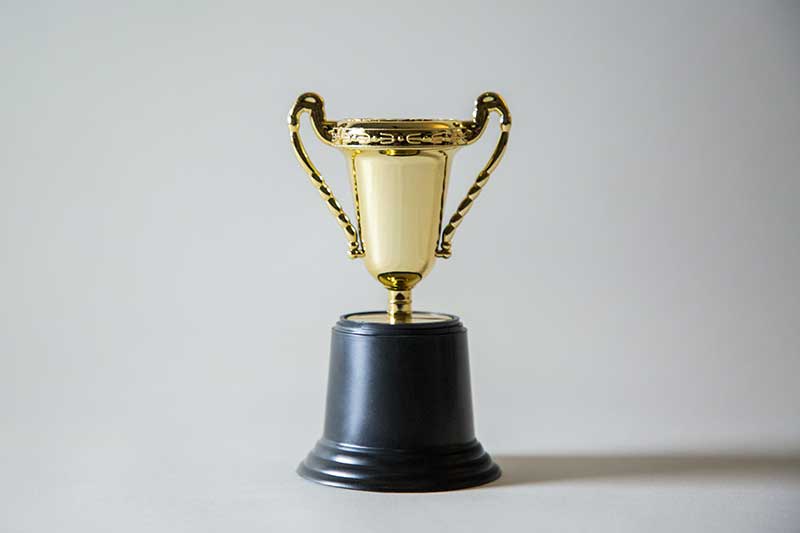Award trophy for best junk removal company